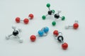 Picture of different greenhouse gases made by molecular model on white background.