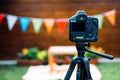 Picture of digital camera placed on tripod Royalty Free Stock Photo