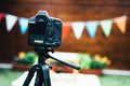 Picture of digital camera placed on tripod Royalty Free Stock Photo