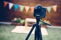 Picture of digital camera placed on tripod Royalty Free Stock Photo