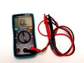 Picture of a digital multimeter, with red and black probe Royalty Free Stock Photo