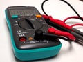 Picture of a digital multimeter, with red and black probe Royalty Free Stock Photo