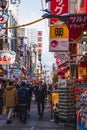 A picture of Dotonbori street filled with people and restaurant signs.