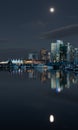 Picture of downtown vancouver canada on a clear night with a full moon, taken from Stanley park Royalty Free Stock Photo