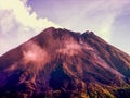 Erupting Arenal Volcano Costa Rica with a red glow Royalty Free Stock Photo