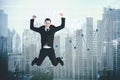 Successful businessman jumping with growth statistic Royalty Free Stock Photo