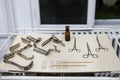 Old gynecology and obstetrics tools, instruments and devices on display in a historic hospital, including various speculums, Axis,
