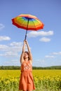 Picture of female holding rainbow umbrella on the Royalty Free Stock Photo