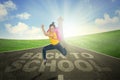 Female student runs above text of back to school Royalty Free Stock Photo