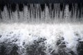 A picture of the flowing water. The dam is designed to regulate the water level in rivers within the city and to provide technical Royalty Free Stock Photo