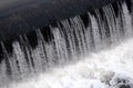 A picture of the flowing water. The dam is designed to regulate the water level in rivers within the city and to provide technical Royalty Free Stock Photo