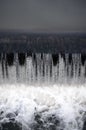 A picture of the flowing water. The dam is designed to regulate the water level in rivers within the city and to provide technical Royalty Free Stock Photo