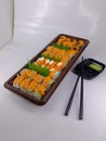 picture of four kinds of sushi with different shapes and different motifs