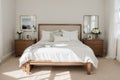 Picture frame and flowers on a dresser in a contemporary bedroom. (Picture in frame is mine.)