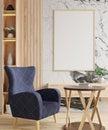 Picture frame on the marble wall in the living room has a blue armchair on the front floor, decorated with flower vases on the Royalty Free Stock Photo
