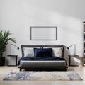 picture frame mock up in home bedroom interio with bed and dark blue pillow, bedside tables, plant with white wall, 3d illustratio Royalty Free Stock Photo