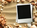 Picture frame on shells and sand background Royalty Free Stock Photo