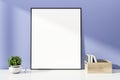 Picture frame on table in purple room Royalty Free Stock Photo