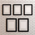 Picture frames on white wall