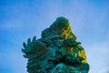 Picture of Garuda statue as Bali landmark with blue sky as a background. Balinese traditional symbol of hindu religion