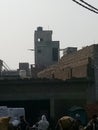 This picture of Ghaziabad vegetable market is in the warehouse where many laborers are working