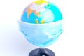 A picture of globe wearing mask for world fighting against Covid-19