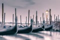 Picture with gondolas moored on Grand Canal near Saint Mark square, in Venice Italy Royalty Free Stock Photo