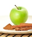 Picture of green apple (focus on cinnamon) Royalty Free Stock Photo