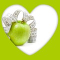 Picture of green apple and measure tape Royalty Free Stock Photo