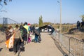 Refugees walking towards the Croatian border crossing on the Croatia Serbia border, between the cities of Bapska and Berkasovo