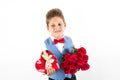 Saint Valentine`s day. Handsome gentleman boy with blue vest, red tie, red roses bucket and red balloons . Valentines day kids. L