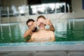 Picture of happy couple relaxing in pool Royalty Free Stock Photo