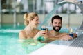 Picture of happy couple relaxing in pool Royalty Free Stock Photo