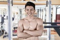 Happy man folded his arms in gym center Royalty Free Stock Photo