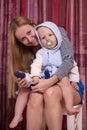 Picture of happy mother with adorable baby boy Royalty Free Stock Photo