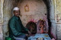 Picture of hindu priest setting at temple for preforming rituals