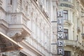 Hirmer department store logo in front of their boutique for Vienna.