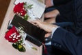 A picture of the Holy Bible with red roses in church Royalty Free Stock Photo