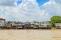 Picture of the houses along the Chao Phraya River when flood tide.Chao Phraya River lifestyle. Royalty Free Stock Photo