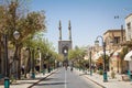 Jameh mosque, with its distinctive tiles minarets, seen from a nearby street. Jameh mosque is the symbol of Yazd