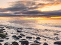 Picture of an idyllic view of the seashore at sunset