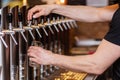 Innkeeper draws a beer at a beer pump