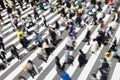 picture with intentional motion blur of crowds of people crossing a city street in Tokyo, Japan Royalty Free Stock Photo