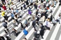 picture with intentional motion blur of crowds of people crossing a city street in Tokyo, Japan Royalty Free Stock Photo