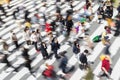 picture with intentional motion blur of crowds of people crossing a city street in Tokyo, Japan Royalty Free Stock Photo