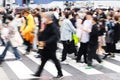 crowds of people crossing a street in Tokyo, Japan Royalty Free Stock Photo