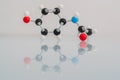 Isolated molecular model of paracetamol with its reflection on a table Royalty Free Stock Photo