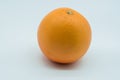 Isolated whole grapefruit on white background Royalty Free Stock Photo