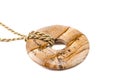 Picture jasper donut on golden chain Royalty Free Stock Photo