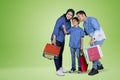 Little boy shopping with his parents on studio Royalty Free Stock Photo